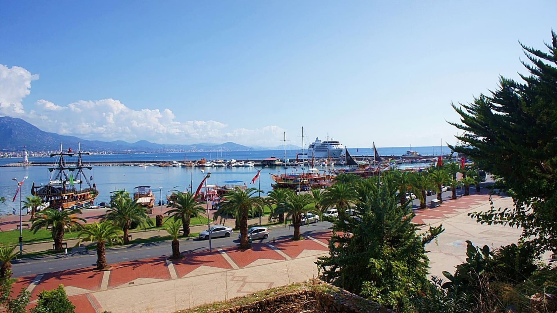 The Mediterranean coastline at Alanya, with the beach curving towards the headland